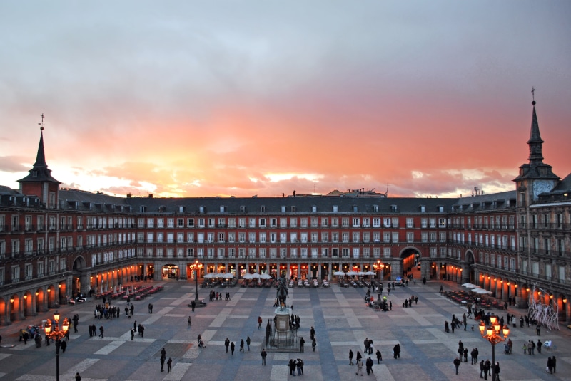 street, large group of people, orange color, outdoors, architecture, 4K, urban Scene, capital Cities, group of people, city, plaza mayor, cityscape, town Square