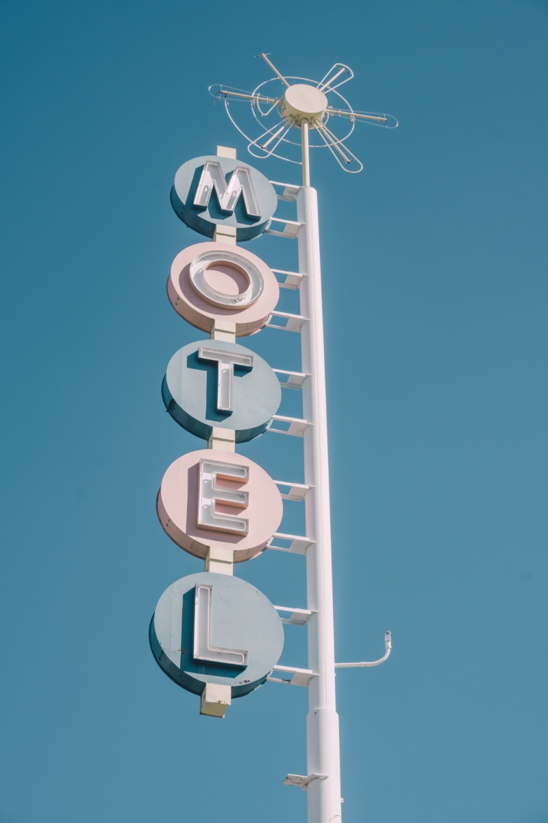blue sky, sign, vintage, guidance, new mexico, fuel and power generation, information, neon, motel, day, pink, lighting equipment, symbol, blue, white