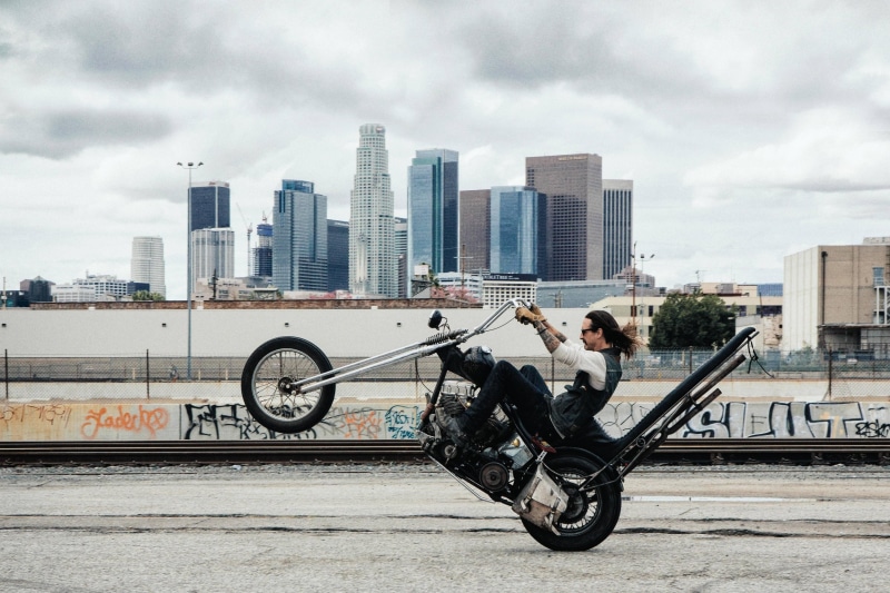 cloud - sky, architecture, men, Los Angeles, sport, biker, young adult, full length, built structure, building exterior, bicycle, chopper, one person, outdoors