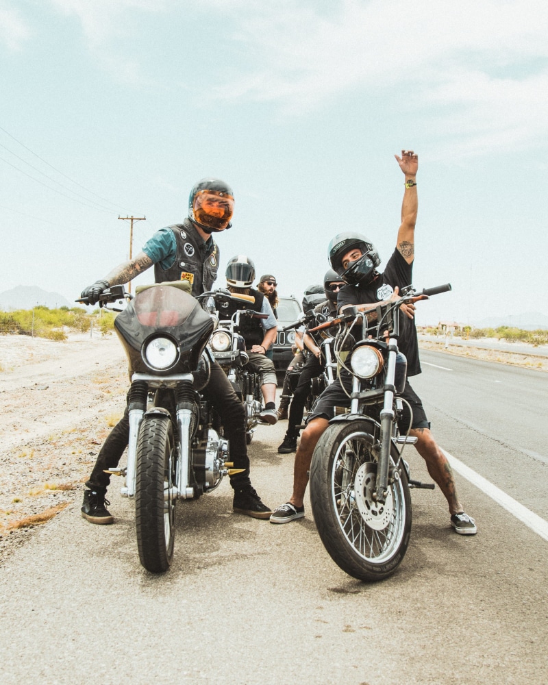 bikes, sky, suv, togetherness, ride, men, crash helmet, black, mode of transportation, blue sky, person, land vehicle, transportation, people, waving, riding