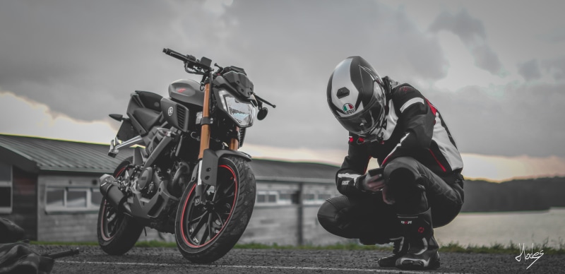 adult, sports helmet, obscured face, helmet, crash helmet, one person, mode of transportation, outdoors, 2K, headwear, unrecognizable person, full length
