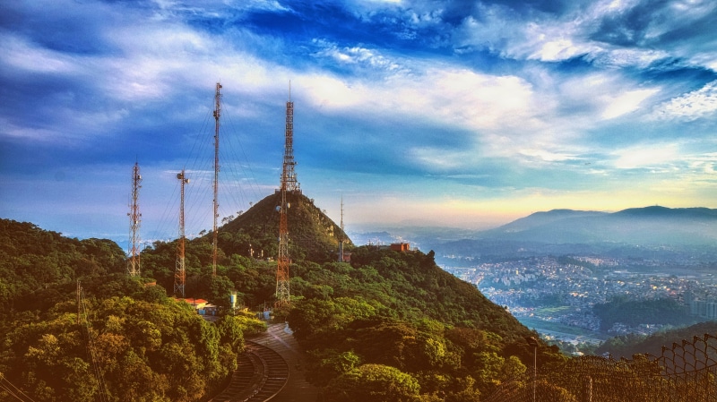 spire, belief, communication, antennas, scenics - nature, cloud - sky, tv, landscape, radio, mountain, beauty in nature, building exterior, antenna, technology