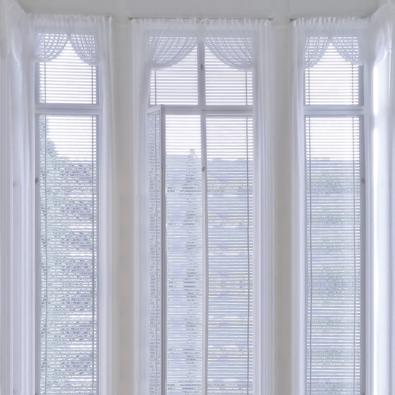 full frame, draperies, close-up, built structure, blinds, glass - material, indoors, white, home interior, building, interior, window blinds, room, window light