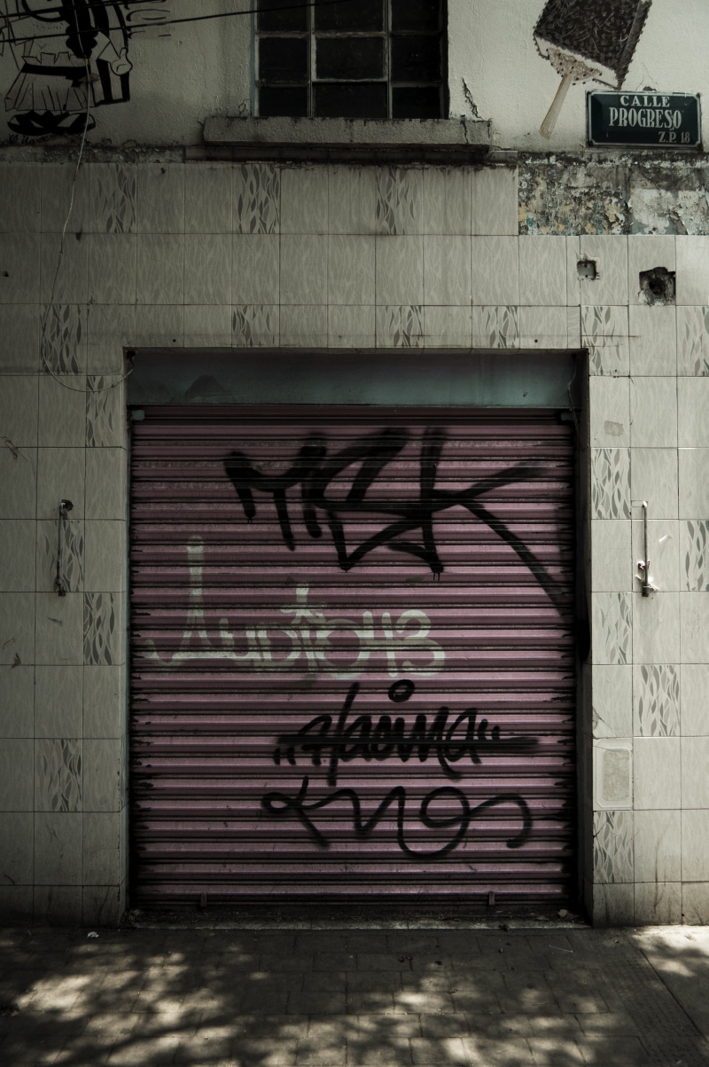 built structure, painting, day, window, graffiti, brick wall, brick, bmx, architecture, entrance, curtain, window shade, closed, cupboard, home decor, shutter