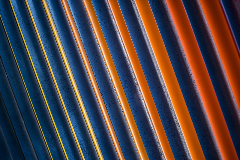 corrugated, indoors, groove, art, pattern, sheet, side by side, red, high angle view, blue, orange, iron, metal, design, full frame, close-up, day, backgrounds
