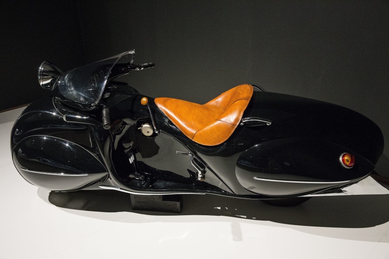citrus fruit, black background, disguise, pair, no people, indoors, arts culture and entertainment, leather, 1930 henderson kj streamline, Henderson, high angle view