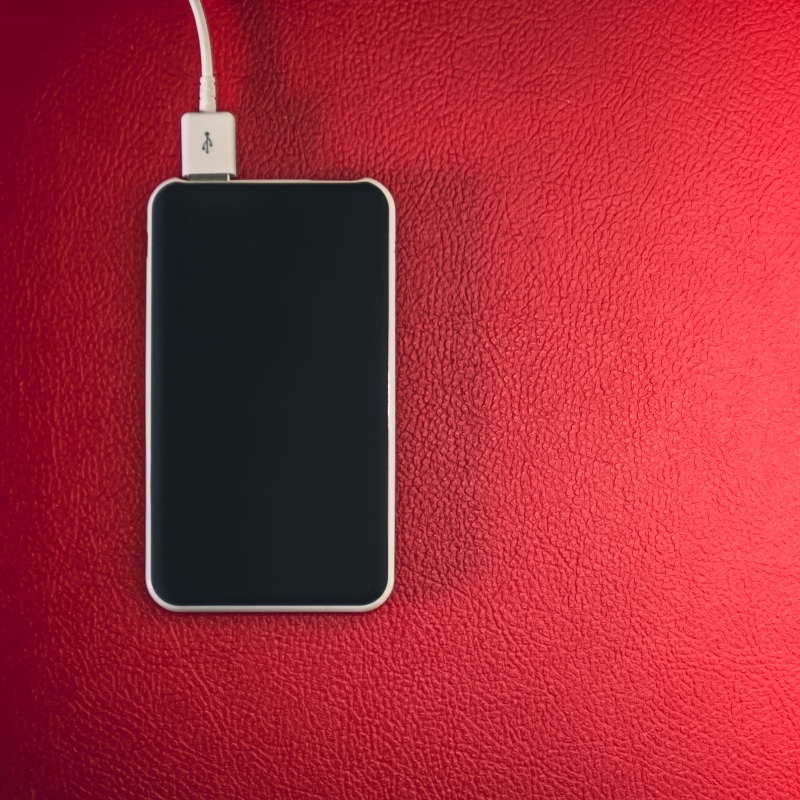 still life, black color, no people, power pack, design, candle, charger, battery, close-up, textured, connection, smart phone, portable, streamline, simplicity