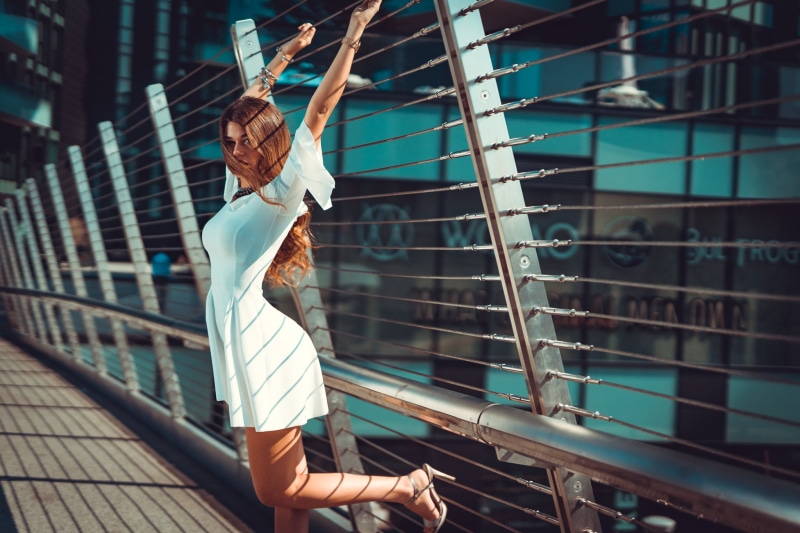 human arm, leisure activity, high heels, Mini, real people, women, full length, day, white dress, architecture, fashion, lifestyles, casual clothing, clothing