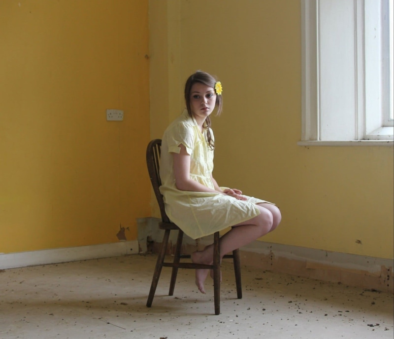 seat, yellow, chair, brunette, women, full length, fashion, real people, portrait, barefoot, hairstyle, sitting, looking at camera, casual clothing, one person
