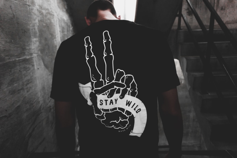 one person, shirt, wild, model, leisure activity, men, black, architecture, back, communication, wall, near, white, printed, 5K, person, midsection, denver