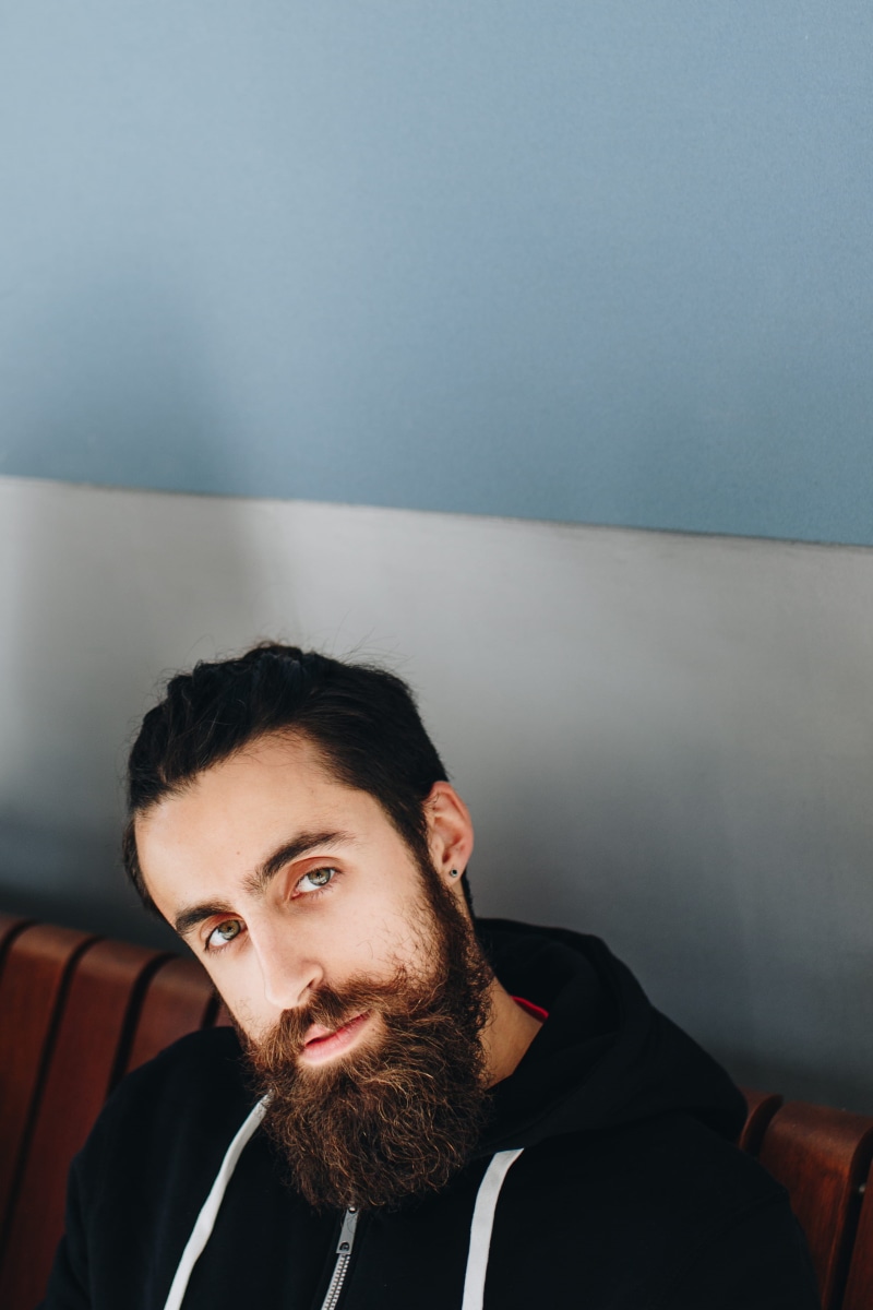 hairstyle, young men, beard, side view, contemplation, profile, home interior, fine-looking, hooded, eyes, person, zip, serious, face, real people, 2K