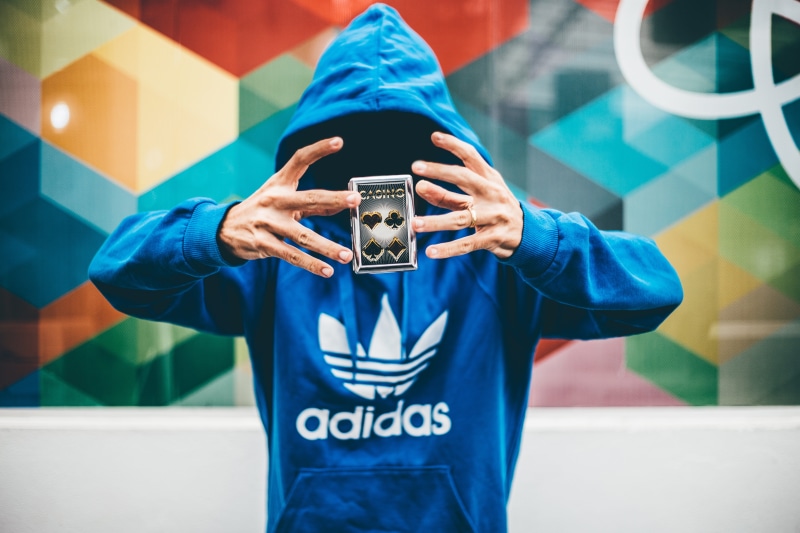 wireless technology, obscured face, camera, camera - photographic equipment, pullover, people, communication, photographing, wearing, levitating, jacket
