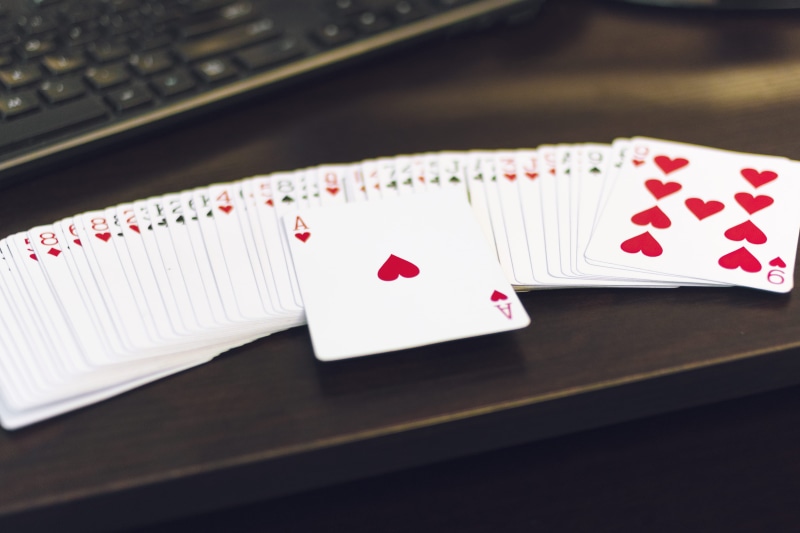 heart shape, cardistry, technology, magician, magicial, 5K, cards, love, ace of heart, indoors, arts culture and entertainment, table, no people, computer