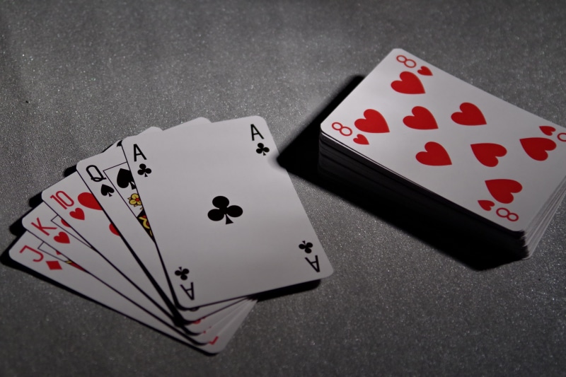 nightlife, leisure games, poker, red, gambling, opportunity, bridge, relaxation, photography, ace, high angle view, indoors, leisure activity, playing cards