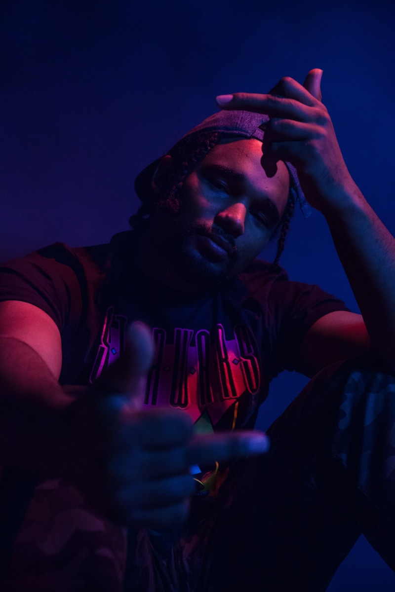portrait, dark, wearing, activity, illuminated, communication, photo, lifestyles, blue, headshot, 5K, young adult, indoors, model, hand, middle finger
