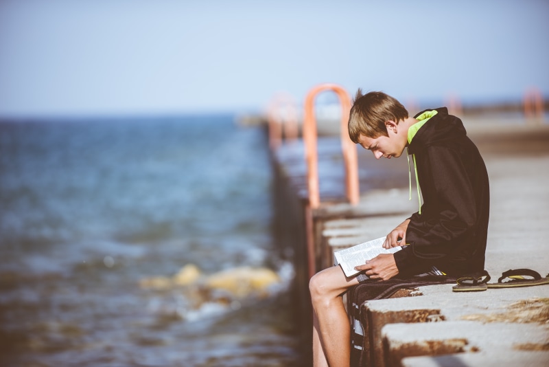 sunset, 5K, man, childhood, book, reading, body, child, black, offspring, focus on foreground, wearing, side view, people, person, sky, leisure activity
