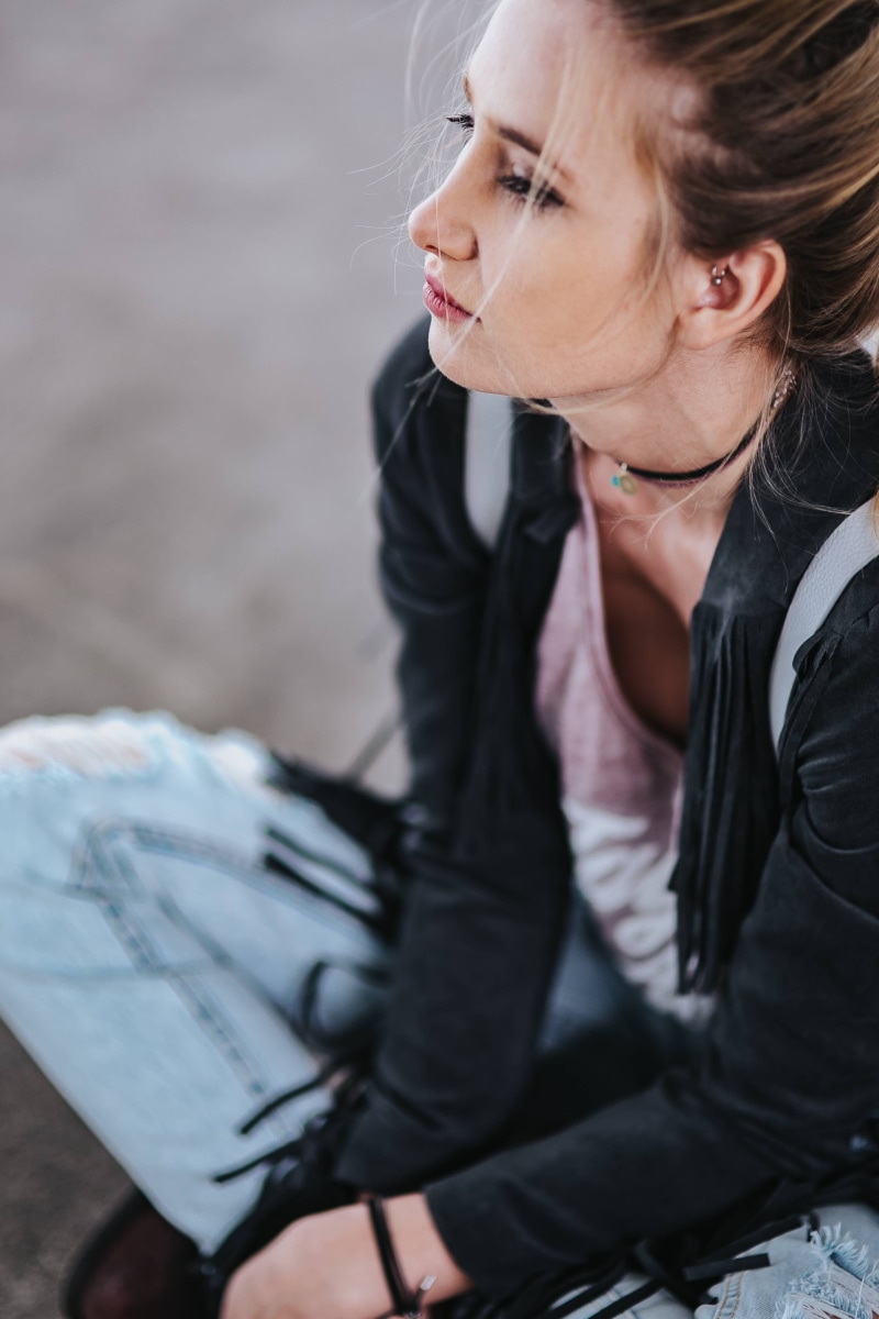 three quarter length, green, young Adult, adults only, focus on foreground, clothing, looking, high angle view, jeans, day, adult, jacket, beautiful woman