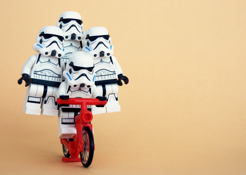 bike, hang on, studio shot, 4K, wobble, bicycle, quartet, day, army, indoors, trick, squad, precarious, storm, evil, riding, military, colored background