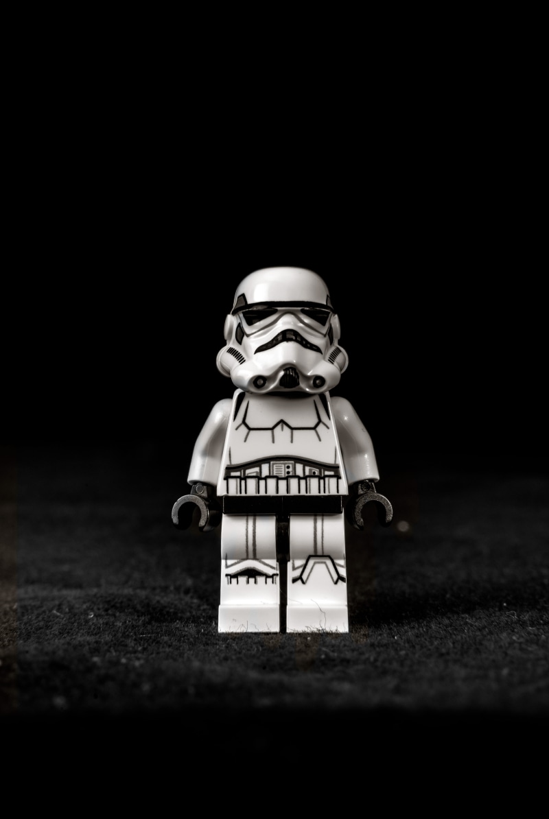 figurine, robot, illuminated, 5K, pirate, dark, label, fun, creativity, white, text, still life, stormtrooper, minifig, single object, silhouette, copy space