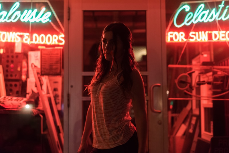 night, sign, 5K, scared, women, young women, hairstyle, dramatic, woman, green, store, illuminated, lifestyles, one person, front, long hair, text, portrait