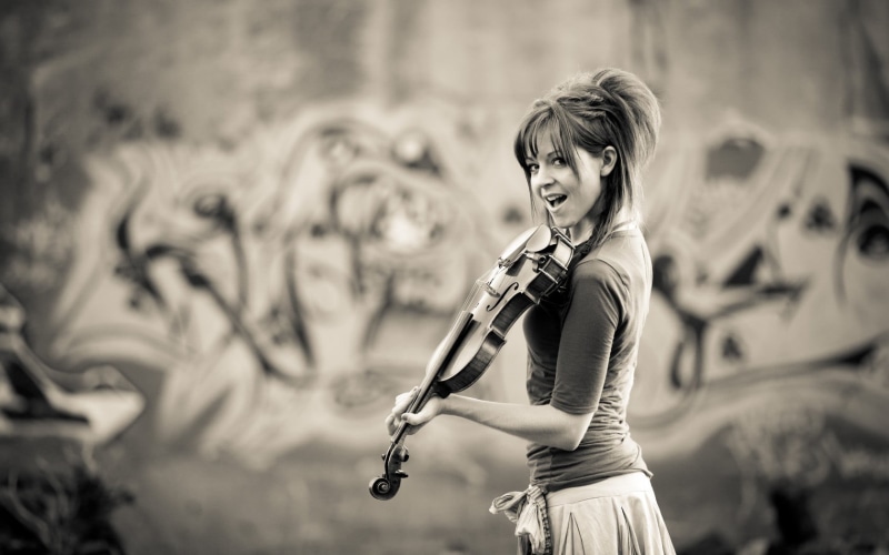 one person, young adult, young women, violinist, lifestyles, beautiful woman, musical instrument, skill, waist up, artist, celebrity, hairstyle, arts culture and entertainment