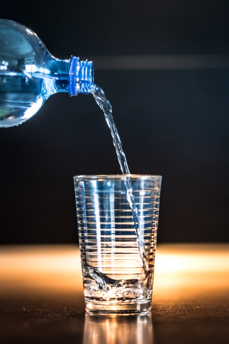 glass, purity, food, liquid, blue, splashing, refreshment, freshness, black background, household equipment, bottle, no people, bottle of water, drink
