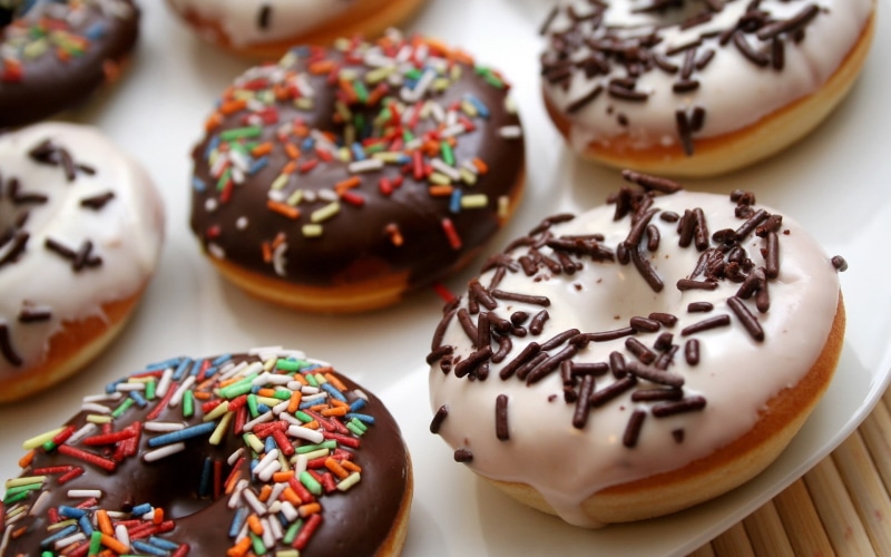 close-up, sweet food, baked, dessert, multi colored, donut, food, chocolate, still life, icing, unhealthy eating, ready-to-eat, sprinkles, sweets, glazed food