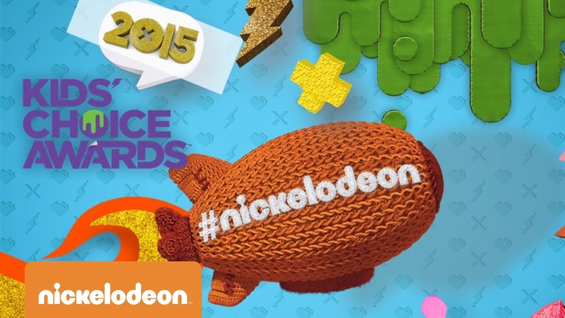 craft, paper, text, single Word, no people, communication, orange, illustration, blue, backgrounds, indoors, high angle view, kids choice awards 2015, art and craft