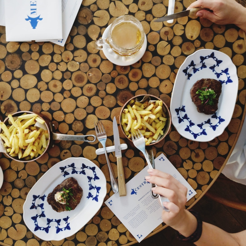 food, wood, fries, women, real people, unrecognizable person, french, food And Drink, eating, plate, restaurant, ready-to-eat, hands, top view, eating out