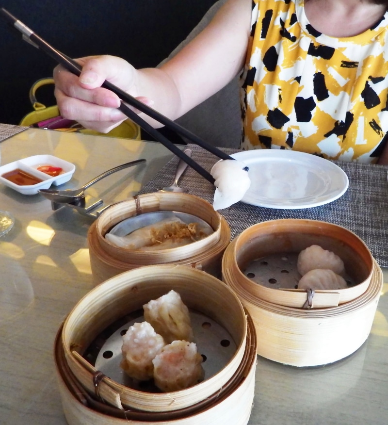chinese, restaurant, lady, real people, bowl, eat, eating, indoors, freshness, chopsticks, 2K, woman, finger, one person, dim, holding, hand, human body part