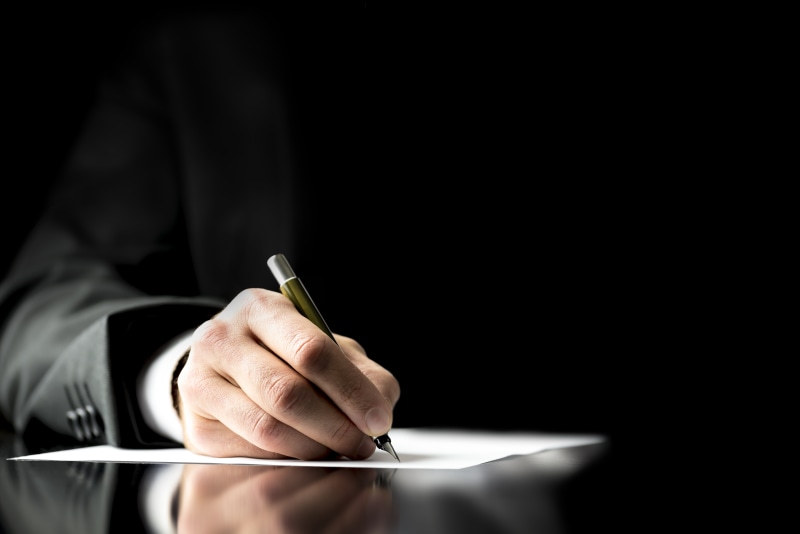 writing, copy space, text, ballpoint, business suit, holding, finger, correspondence, paper, adult, paperwork, human body part, close-up, businessman, business person