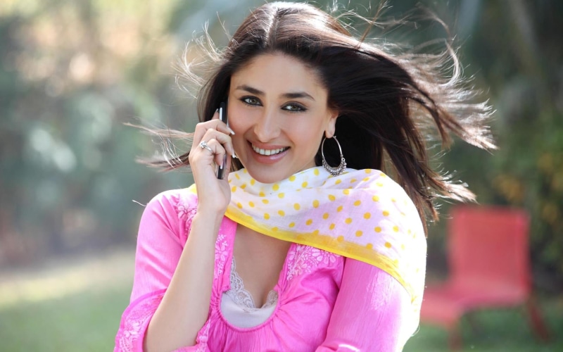 pink color, holding, kapoor, 1080P, top, scoop, bollywood, focus on foreground, hairstyle, cell, portrait, outdoors, kareena, young adult, neck, pink