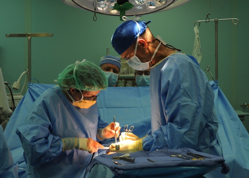 healthcare worker, operating gown, medical, professional Occupation, people, teamwork, health, indoors, care, protective Mask - Workwear, operation, surgical mask