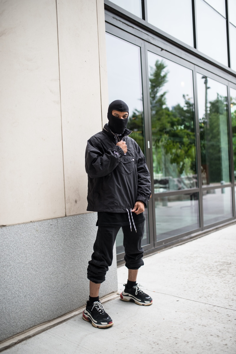 city, shoe, young, built structure, building exterior, leisure activity, man, guy, ski mask, wall - building feature, wearing, balaclava, clothing, architecture