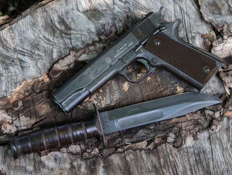 warning sign, handgun, social issues, old, ammunition, weapon, gun, pistol, 1080P, black color, bowie, table, indoors, automatic, wood - material, day