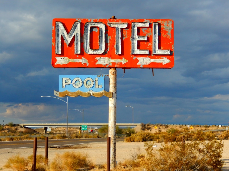 road, arrow symbol, signal, neon, western script, blue, outdoors, information sign, architecture, no people, road trip, abandoned, vintage, nature, guidance