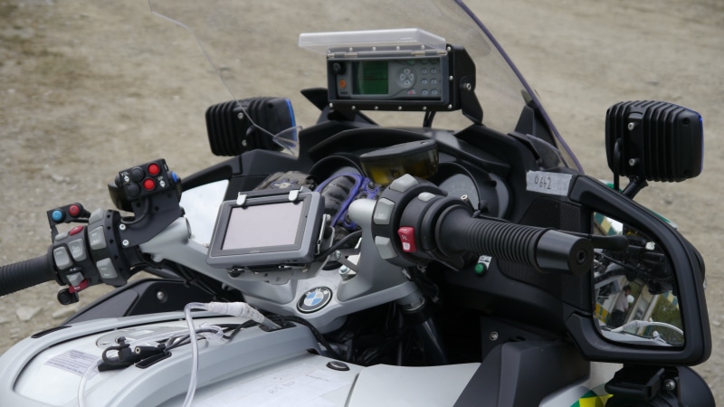 transport, ambulance, outdoors, engine, fast, stationary, emergency, medicine, land vehicle, video, focus on foreground, treatment, vehicle part, team