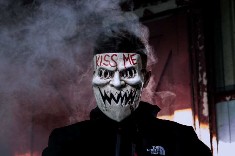 mask - disguise, one person, celebration, adult, halloween, north, smoke - physical structure, purge, person, still, face, screenshot, movie, portrait