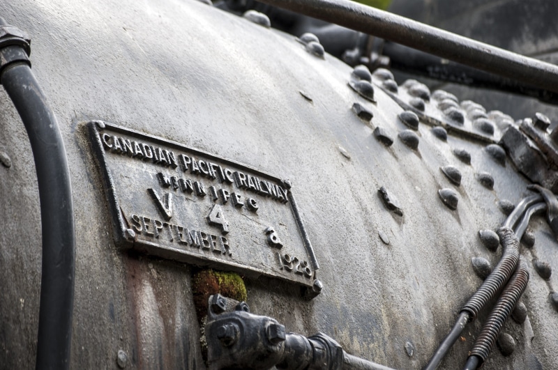 outdoors, history, cargo, rust, subway, rusty, historical, 2K, close-up, retro, information sign, old, locomotive, vintage, focus on foreground, vehicle