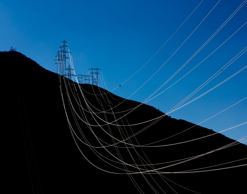 architecture, wire, low angle view, no people, electric, mountain, power Line, connection, sky, razor wire, transmission, power supply, outdoor, fuel and power generation