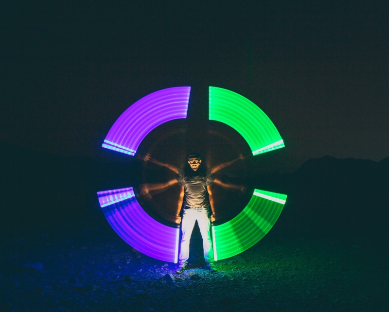 multi colored, outdoors, motion, one person, adult, fixtures, rear view, background, light, protection, long exposure, man, time, leisure activity, real people