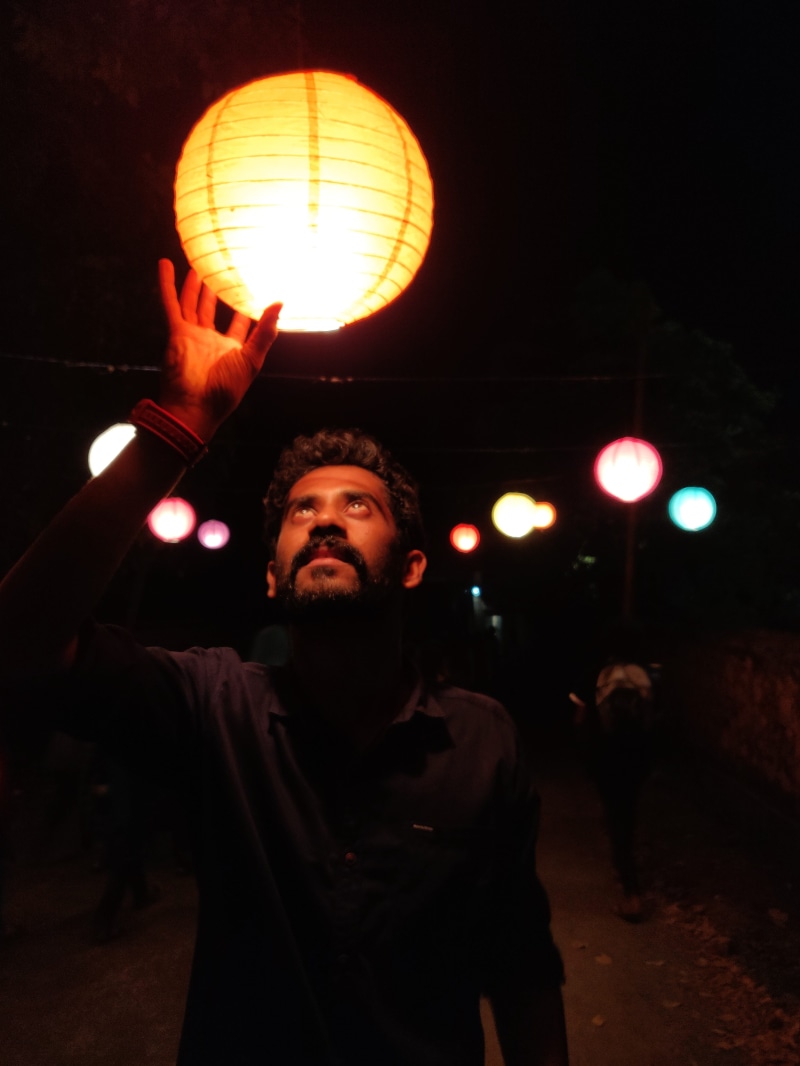 waist up, evening, lantern, hand, leisure activity, portrait, hanging lights, front view, flame, illuminated, spooky, night photograph, sky, light, holding
