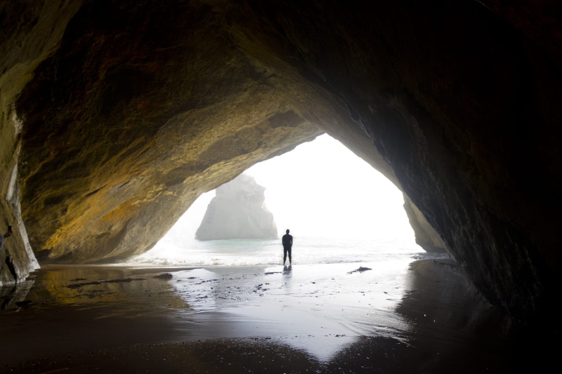 natural arch, solid, dark, rock formation, wafe, beach, sea, land, arch, person, photography, tranquility, ocean, water, rock, stone, beauty in nature