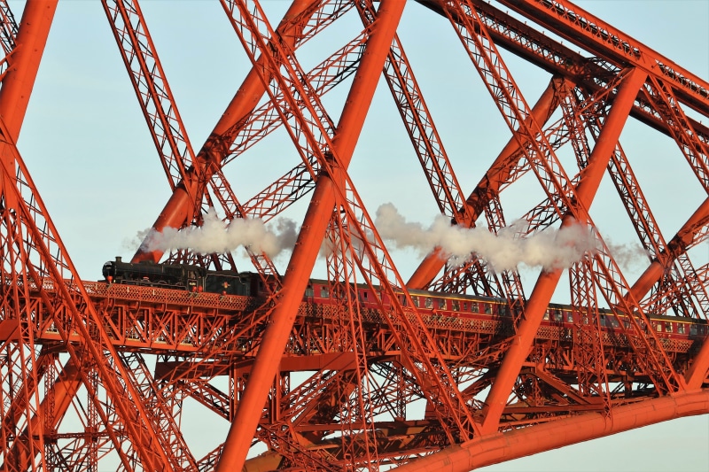 construction site, metal, vehicle, construction industry, bridge - man made structure, train, bridge, low angle view, day, girder, transportation, industry
