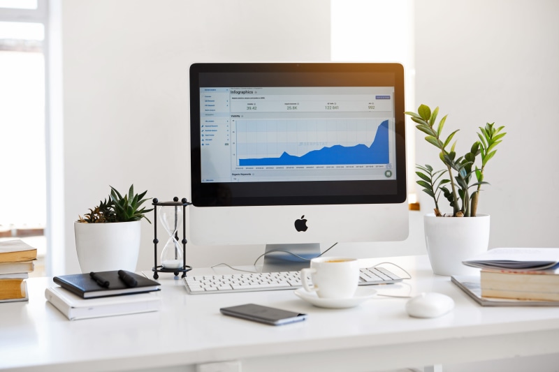analytics, mouse, books, desk, seo, connection, coffee, macbook, notebook, monitor, digital, wireless technology, computer monitor, notepad, plant, cup