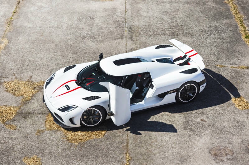 crash helmet, hypercar, transportation, city, motor racing track, mode of transportation, Agera R, veyron, motor vehicle, 2K, street, white, day, stationary