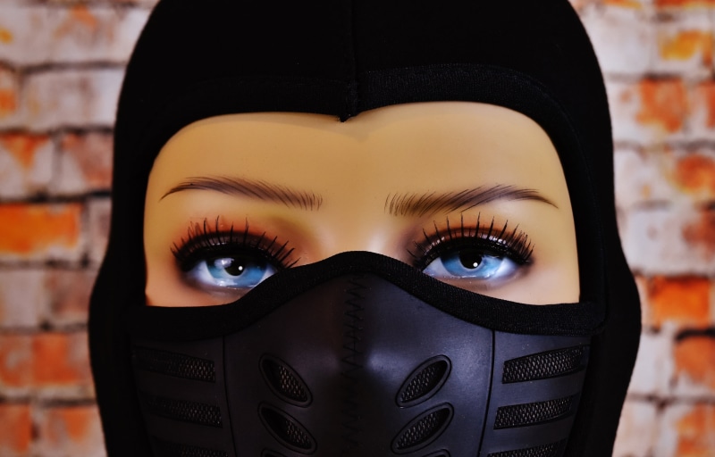 eye, headwear, one young woman only, human face, eyes, looking at camera, disguise, one person, eyebrow, cap, ski mask, iris - eye, beauty, young adult