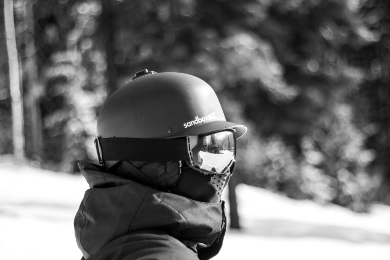 profile, focus on foreground, photography, standing, goggle, headwear, person, winter, warm clothing, ski, tree, uniform, clothing, work helmet, sport