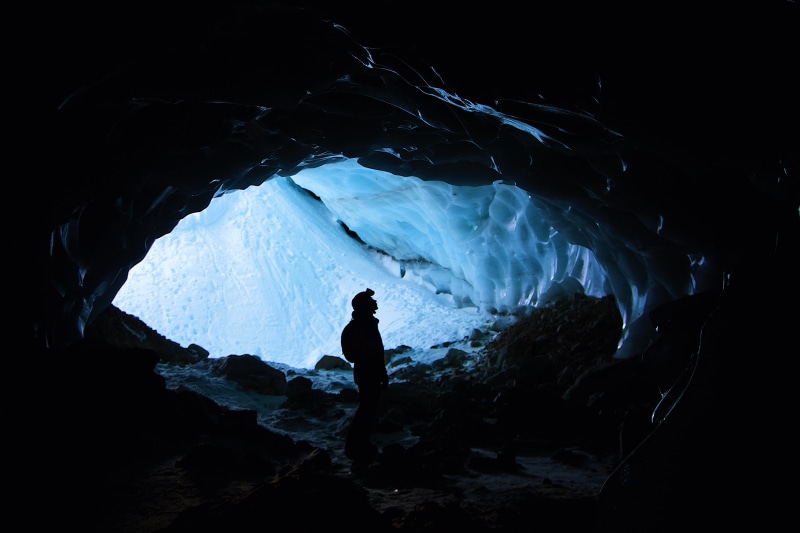 ski jacket, outdoors, ice cave, cave, 5K, inside, la grave, real people, lifestyles, standing, ice, blue, snow, silhouette, leisure activity, helmet, dark