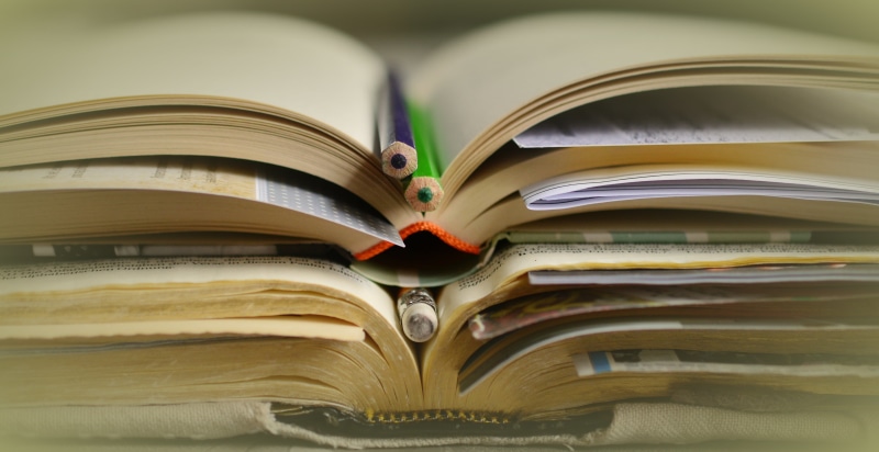 indoors, pitched, photography, two, closeup, paper, book, hardcover book, studying, publication, literature, open, reading, activity, expertise, pencils